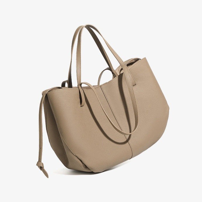 Elegant tygväska i äkta läder med pebbled läderficka