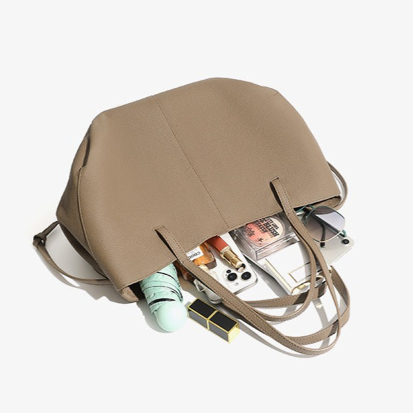 Elegant tygväska i äkta läder med pebbled läderficka