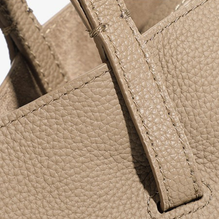 Elegant tygväska i äkta läder med pebbled läderficka