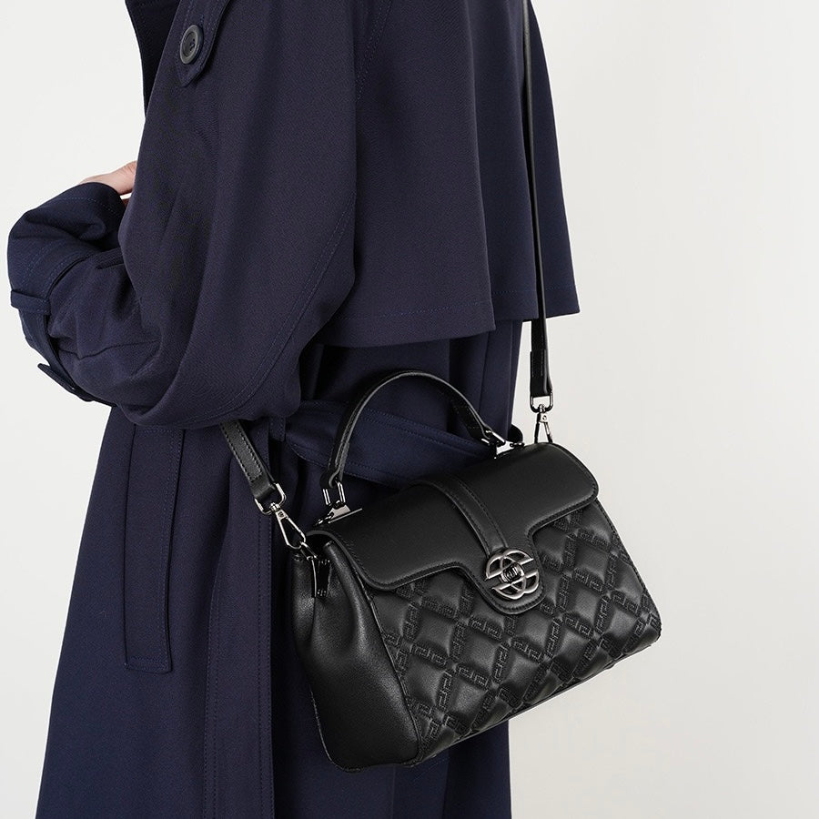 Pendlarväska i äkta läder med prägling