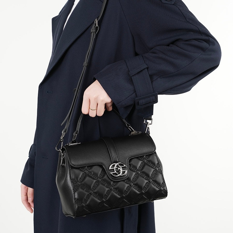 Pendlarväska i äkta läder med prägling