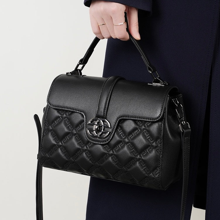 Pendlarväska i äkta läder med prägling