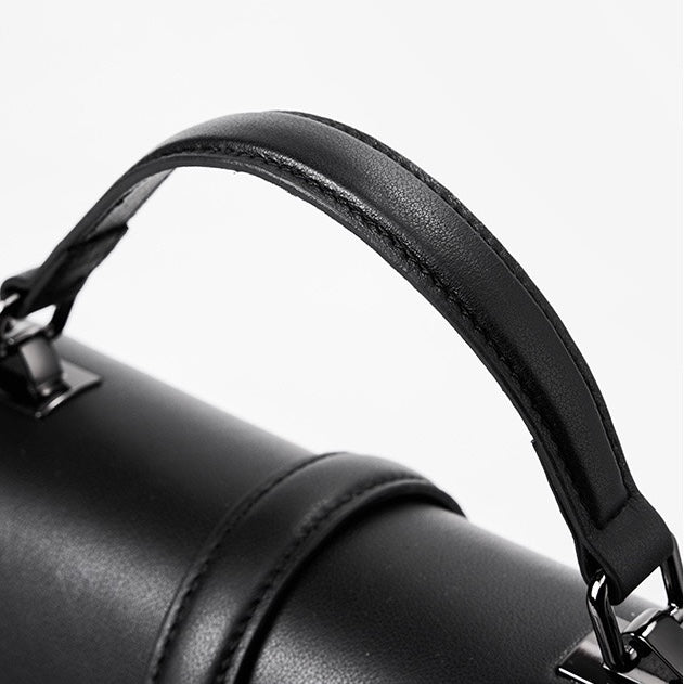 Pendlarväska i äkta läder med prägling