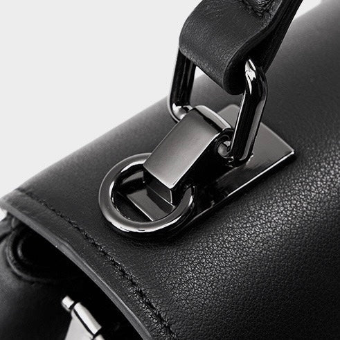 Pendlarväska i äkta läder med prägling