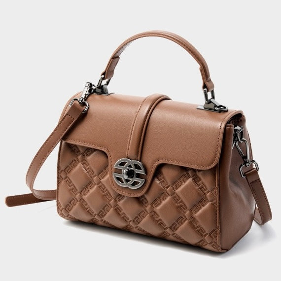 Pendlarväska i äkta läder med prägling