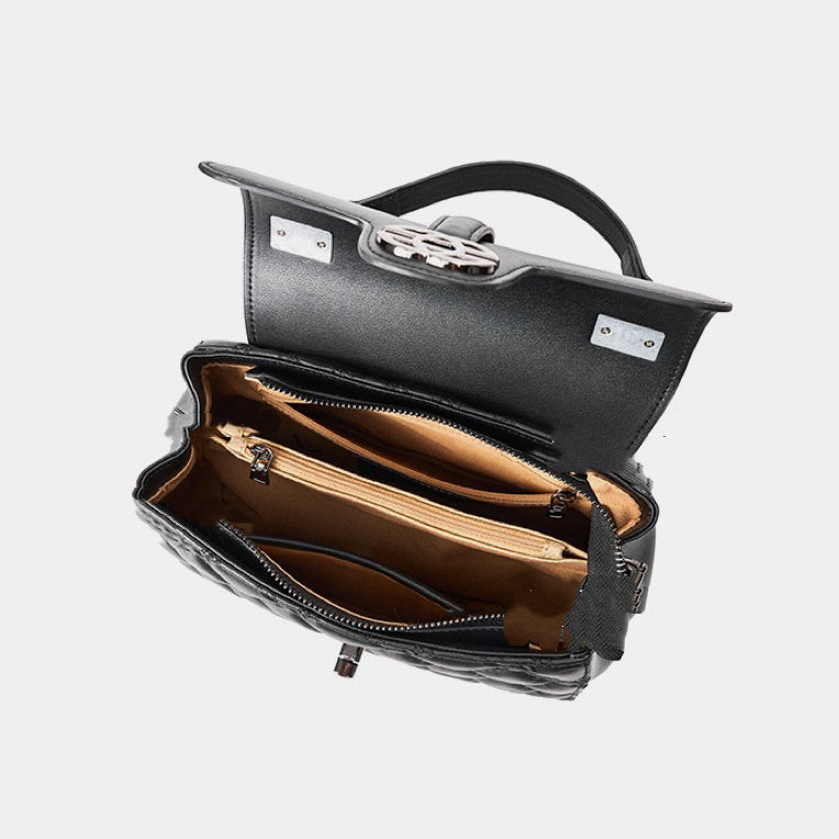 Pendlarväska i äkta läder med prägling