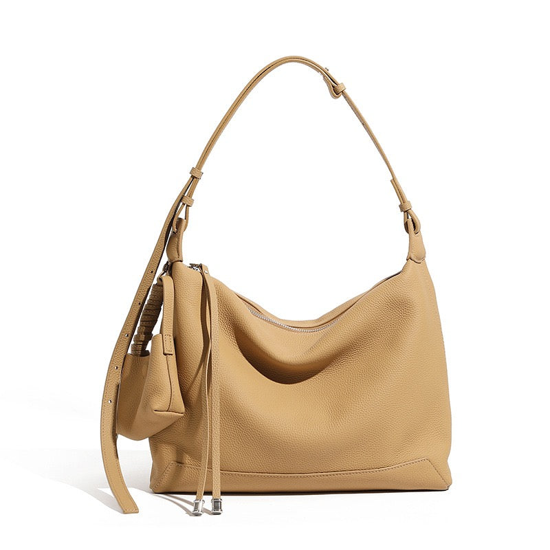 Minimalistisk axelväska i äkta läder med stor kapacitet