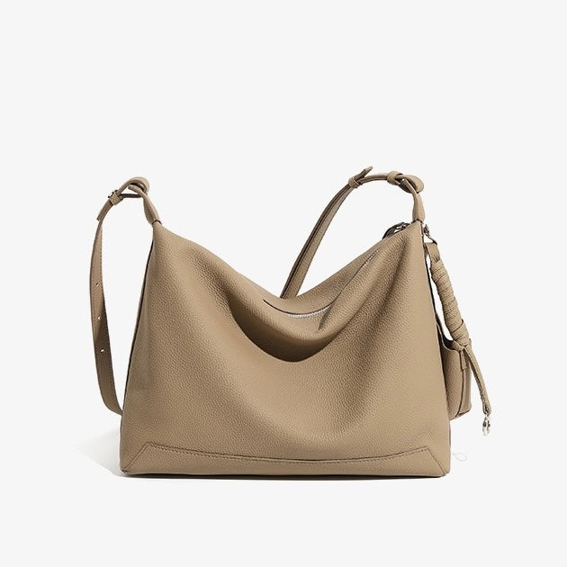 Minimalistisk axelväska i äkta läder med stor kapacitet