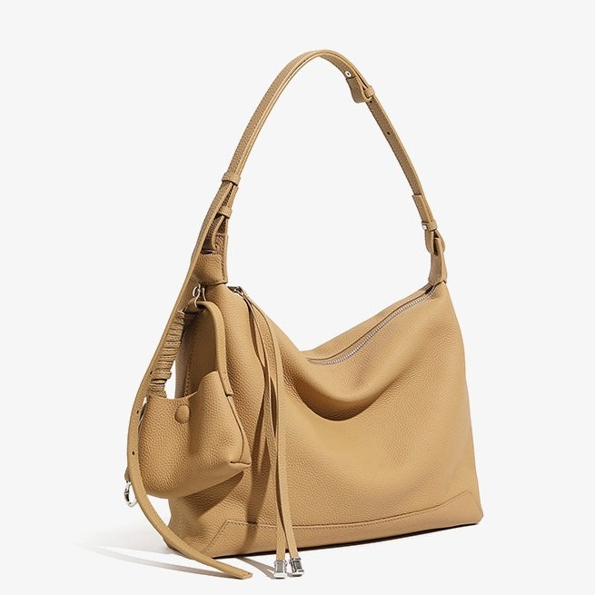 Minimalistisk axelväska i äkta läder med stor kapacitet