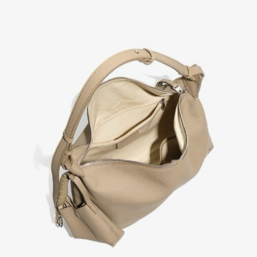 Minimalistisk axelväska i äkta läder med stor kapacitet