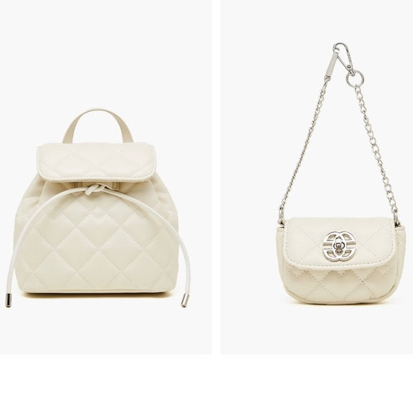 Elegant diamantbeklädd miniryggsäck i äkta läder med avtagbar ficka