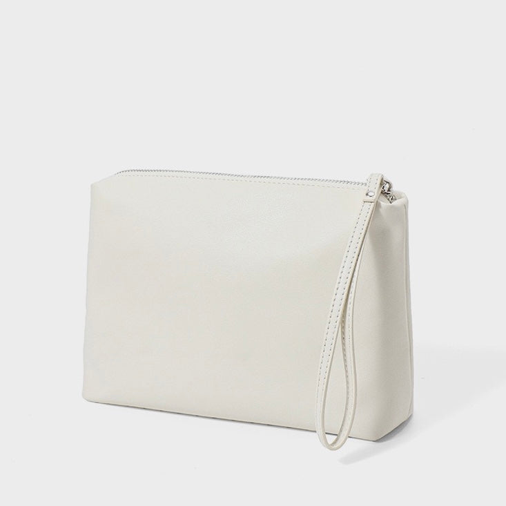 Perforerad tygväska i äkta läder med avtagbar ficka