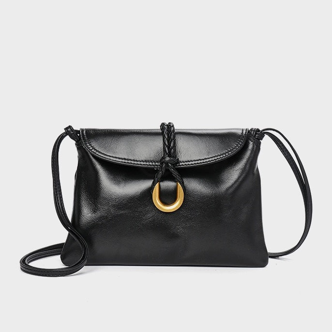 Lyxig flätad kuvertformad axelväska i läder