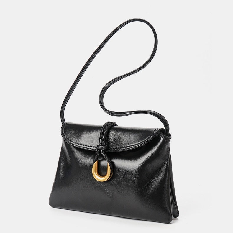 Lyxig flätad kuvertformad axelväska i läder