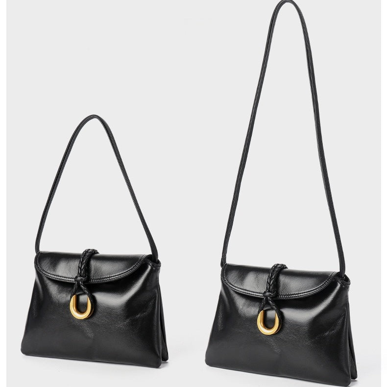 Lyxig flätad kuvertformad axelväska i läder