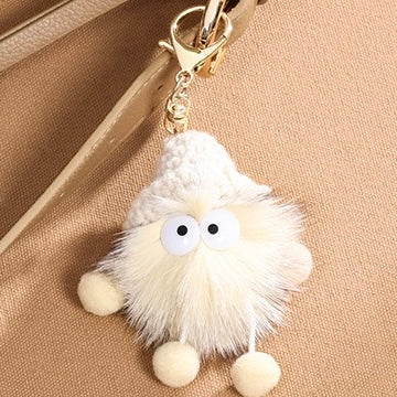 Elegant geometrisk axelväska i äkta läder med plyschberlock