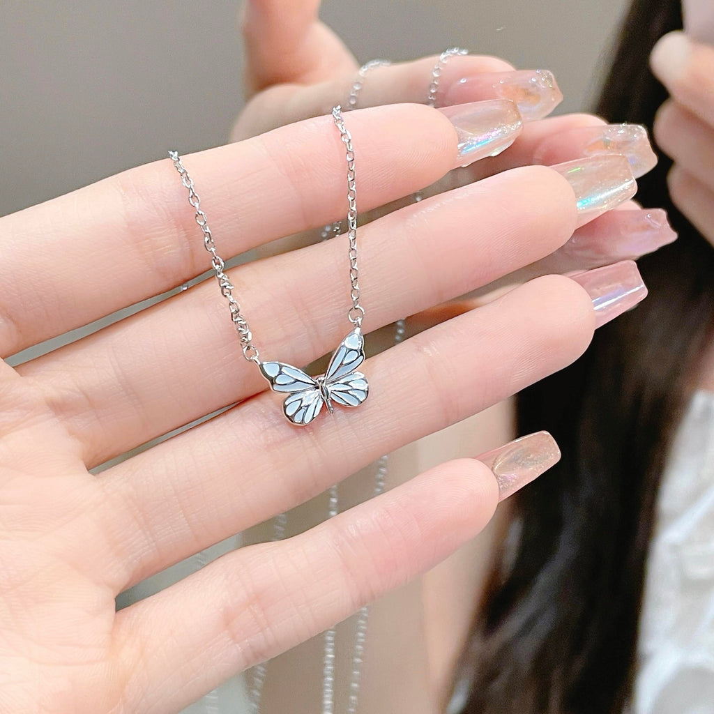 Lysande dröm blå fjärilssmyckespaket