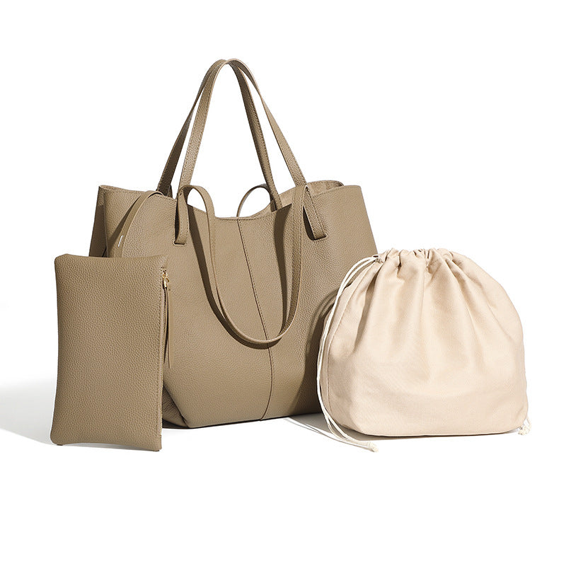 Elegant tygväska i äkta läder med pebbled läderficka