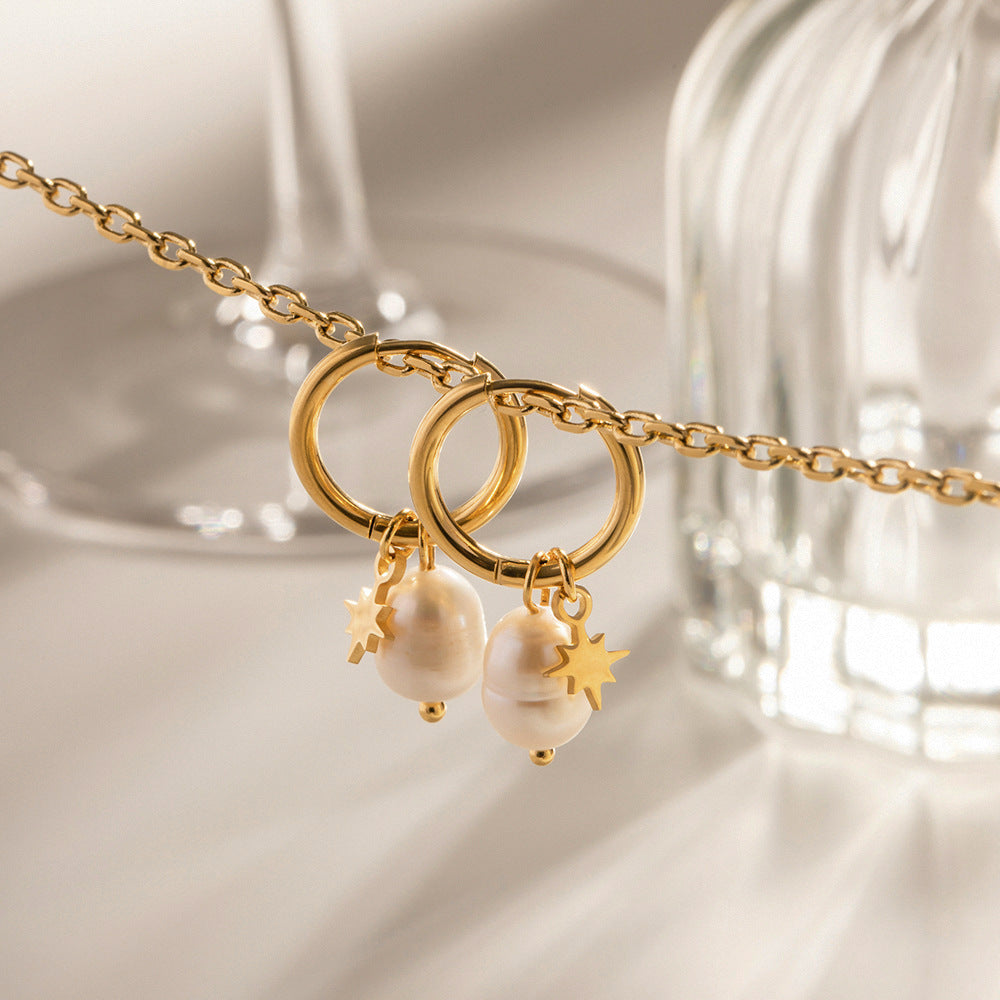 Örhängen med naturliga sötvattenspärlor och stjärnhängen